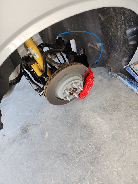 Cut out of wheel well liner.jpg